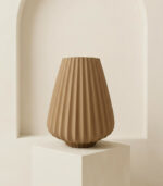 Contemporary sculptural vase styled in a modern minimalist interior