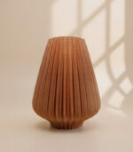 Side angle of Arka geometric vase with layered vertical lines and modern silhouette